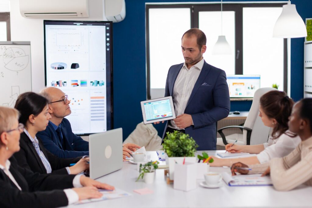 WEB OPTIMIZED succesful business man presenting the good evoluti 2026 01 08 02 12 38 utc