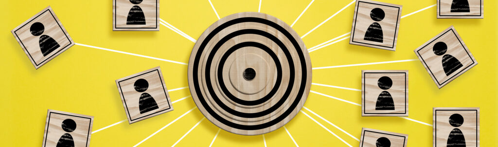 connecting people wooden icons targeting goal 2026 03 24 14 03 32 utc
